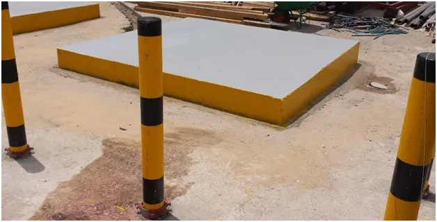 Construction of foundations and installation of barricade posts.