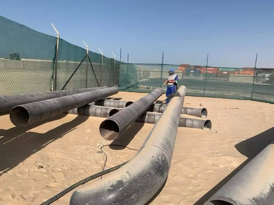 Fabricated pipe spools staged for installation.