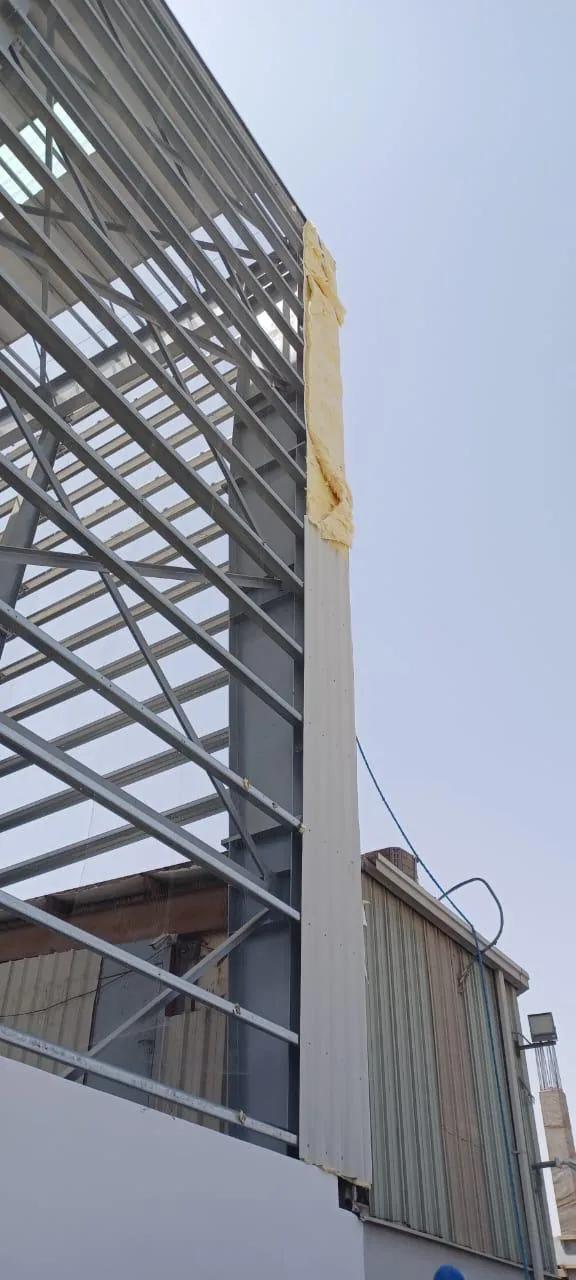 Structural steel frame erection on site.