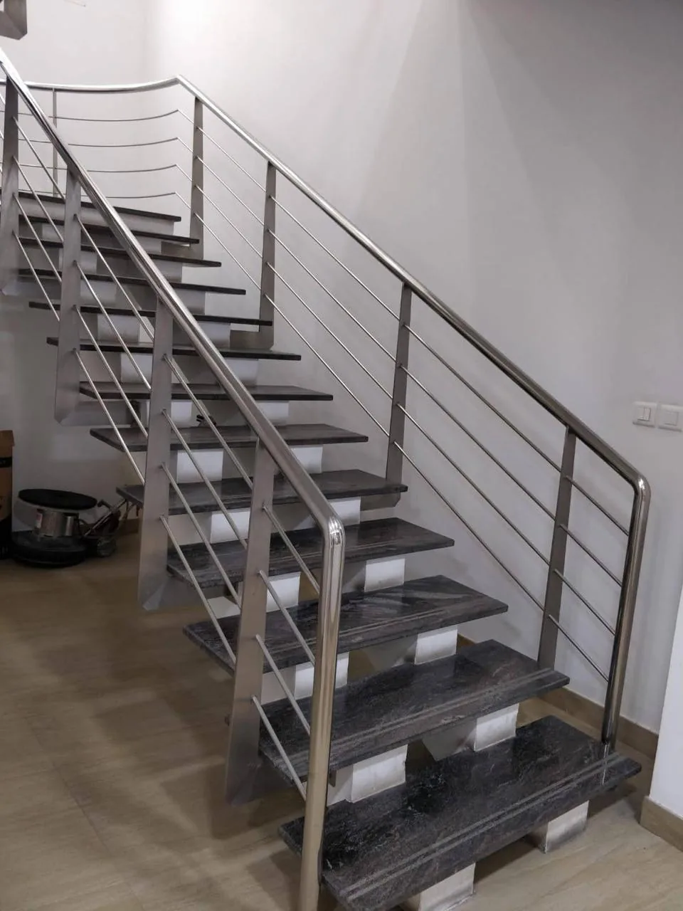 Stainless steel staircase fabrication and installation.